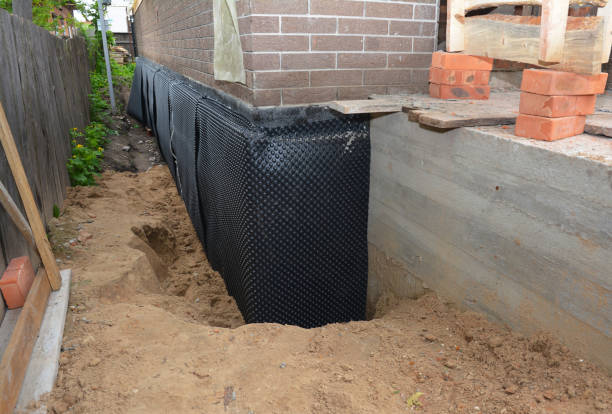 SJ Waterproofing Pros technician performing targeted Vapor Barrier Installation assessment in Marcus Hook, PA